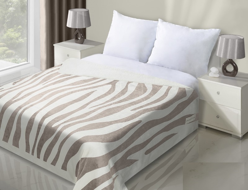 Młodzieżowe narzuty białe na pojedyńcze łóżko z beżową zebrą