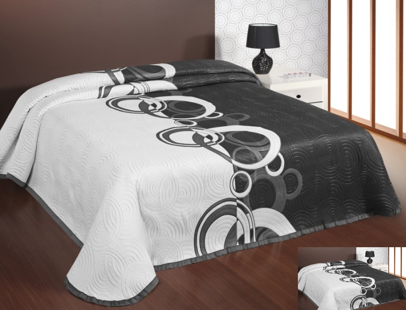 Dwustronna czarno biała narzuta na łóżko w koła