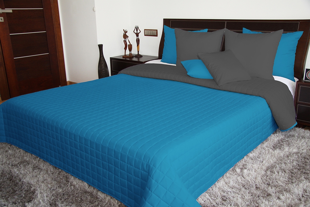 Modna narzuta na łóżko w kolorze niebiesko grafitowym