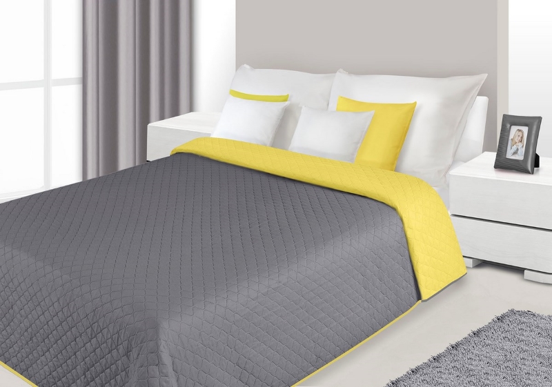 Narzuty i kapy dwustronne w kolorze stalowo żółtym na łóżko