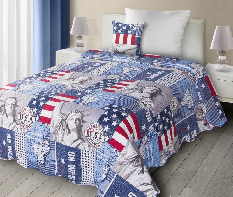 Narzuty na pojedyńcze łóżka w kolorze niebieskim ze Statułą Wolności
