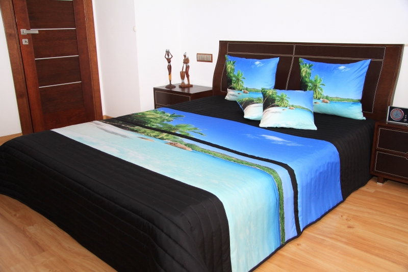 Narzuty modne na łóżko w kolorze czarnym z morzemi i palmami